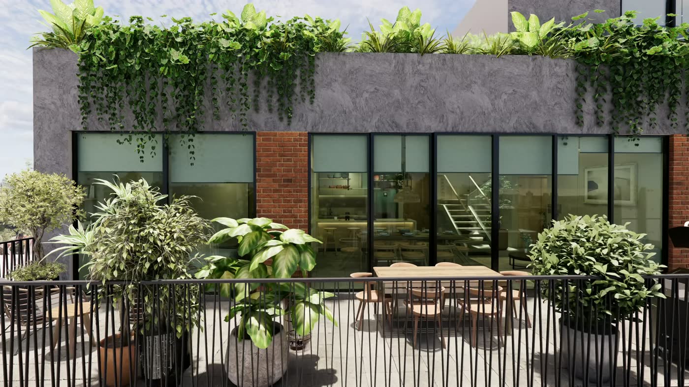 Terraza con plantas y comedor exterior